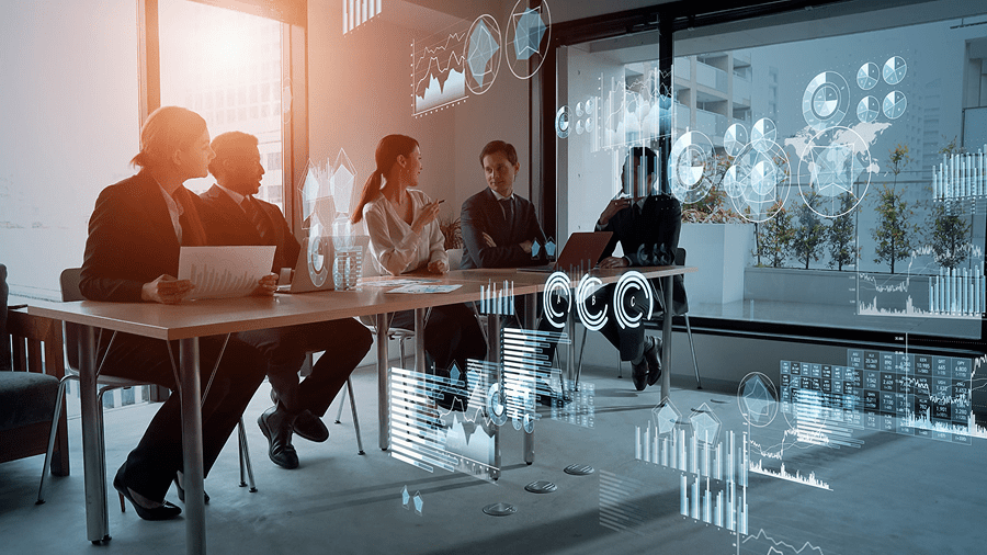 Business meeting with digital data overlays.